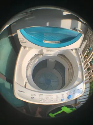 a close up of a washing machine with its door open at Beautiful space in Ban Sam Kong