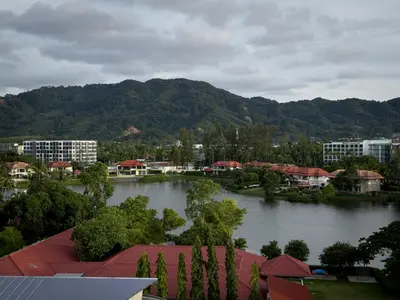 a view of a river with buildings and a city at Skypark by Villacarte in Laguna Phuket