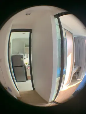 a reflection of a window of an airplane at Fab condo in Ban Tha Khreng