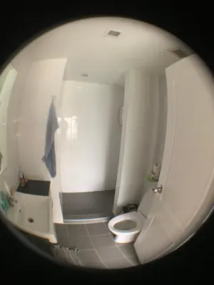 a small bathroom with a toilet and a sink at Fab condo in Ban Tha Khreng