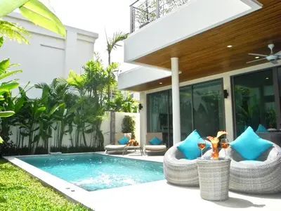 a swimming pool in front of a villa at Rawai Beach Pool Villa 3 bedrooms in Rawai Beach