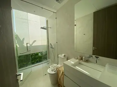 a bathroom with a toilet and a sink and a shower at 3bdr New Modern Pool Villa Bangtao ASH-05 in Ban Phru Champa