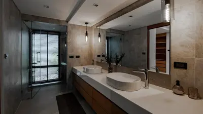 a bathroom with two sinks and a large mirror at Luxury Modern Loft Villa Riverhouse in Laguna Phuket