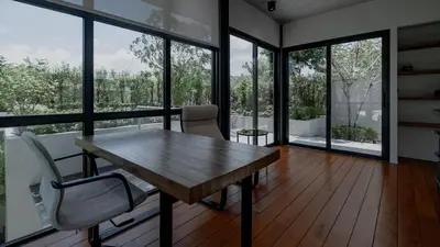 a dining room with a table and chairs and windows at Luxury Modern Loft Villa Riverhouse in Laguna Phuket