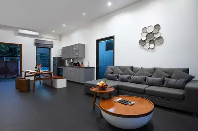 a living room with a couch and a table at Thai Balinese Villa Rico in Kamala 3BR, Private Pool in Kamala Beach