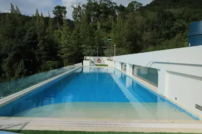 a swimming pool on the deck of a cruise ship at Fantasea Kamala 1 BR Apartments Near Beach 212 in Kamala Beach