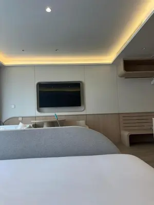 a room with a flat screen tv on the wall at Wyndham studio 2205 in Surin Beach