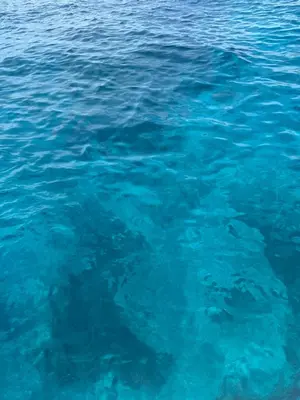 a large pool of blue water in the ocean at Wyndham studio 2205 in Surin Beach
