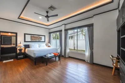 a bedroom with a bed and a large window at V175 Huge 21M Pool 5-BR 1Km 2 Kamala Beach in Kamala Beach