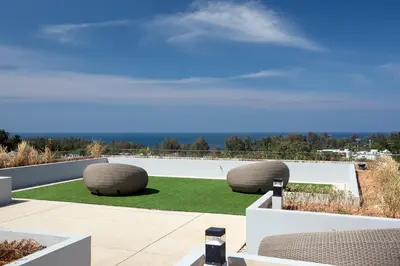 a view of two seating spheres on a patio at 1bdr Seaview Apartment near Surin Beach in Surin Beach