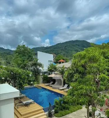 an image of a swimming pool at a resort at Apartments Near Bangtao Muay Thai & MMA in Ban Thalat Choeng Thale