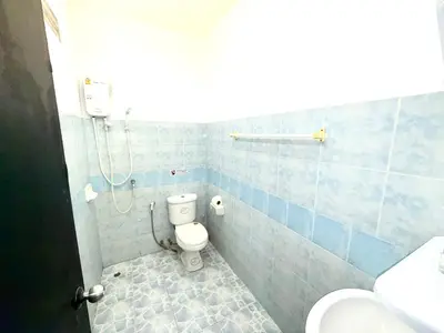 a bathroom with a toilet and a shower at Patong Canal Villa 107 in Patong Beach