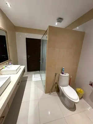 a bathroom with a toilet and a sink and a shower at Luxury Pool Villa Nai Harn in Ban Saiyuan (1)