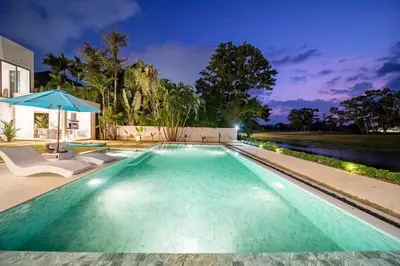 an image of a swimming pool in a house at Lumière Villas Phuket - Golfside Retreat in Laguna in Laguna Phuket