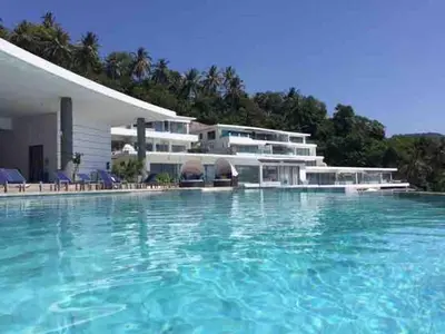 a large swimming pool in front of a building at The View Phuket F9 in Kata Beach