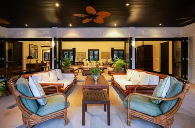 a living room with couches and a table at Katamanda villa Eden Large Villa near Kata Beach in Kata Beach