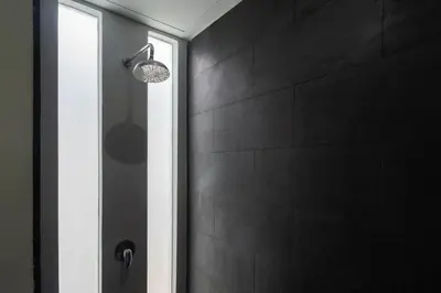 a shower in a bathroom with a glass door at Pool Villa Martin 3BR, Rawai in Rawai Beach