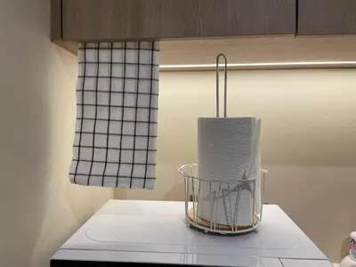a vase sitting on top of a kitchen counter at Laya Residence Memoory Layan in Ban Na Bon