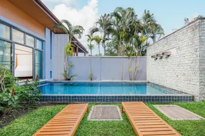 a swimming pool in the backyard of a house at Villa Neya 2BR Private Pool Close to Naiharn Beach in Rawai Beach