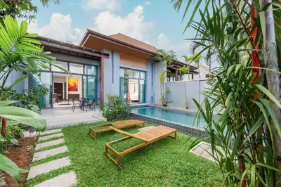 a backyard with a pool and a house at Villa Neya 2BR Private Pool Close to Naiharn Beach in Rawai Beach