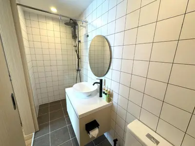 a bathroom with a sink and a mirror at New 2br apartment -stylish Fantasea Kamala Condo in Kamala Beach