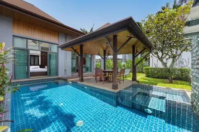 a pool with a gazebo next to a house at VILLA Hanga 3BR Private Pool Nai Harn Beach in Nai Harn Beach