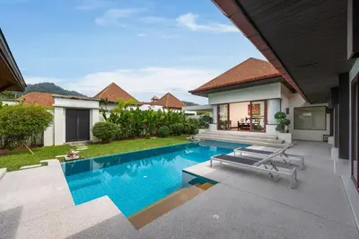 a swimming pool in the backyard of a villa at Villa Iorangi 3 Bedroom Private Pool in Rawai Beach