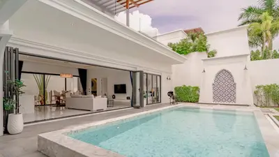an indoor swimming pool in a villa at Bang Tao Luxury Villa - Menara Hill in Ban Phak Chit