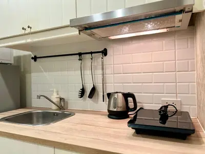 a kitchen counter with a toaster and a sink at The Title NaiyangPhuket1 in Phuket