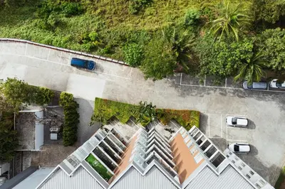an overhead view of a house with a car parked at Karon Beach Hill View Appartment in Karon Beach