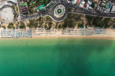 an aerial view of a beach with boats in the water at Karon Beach Hill View Appartment in Karon Beach