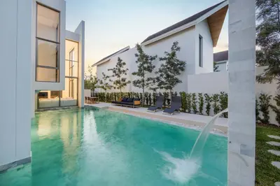 a swimming pool in the backyard of a house at Luxury 3BR Villa Wallaya with Private Pool in Bang Tao Beach