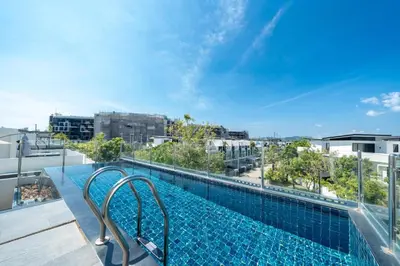 a swimming pool on the roof of a building at Phuket villa in Laguna in Bang Tao Beach