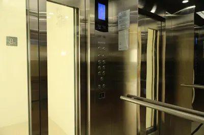 a stainless steel elevator in a subway station at Premium 2BR near Kamala Beach, Pool, Gym & Shuttle Bus in Phuket Town