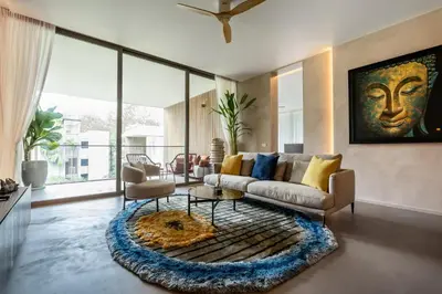 a living room with a couch and a rug at Luxury Penthouse 407sqm Beachfront and private pool in Phuket Town