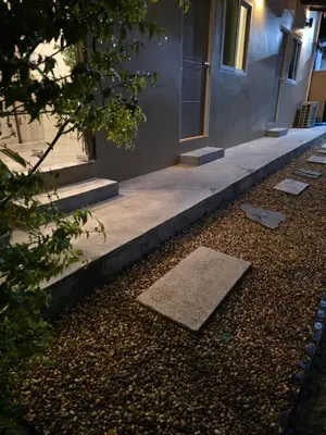 a building with a set of stairs in front of it at ASAP Boutique Phuket in Ban Thalat Choeng Thale