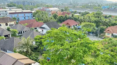 an aerial view of a city with houses and trees at Fantasea Kamala 1 BR Near Fantasea Show & Beach 505 in Phuket Town