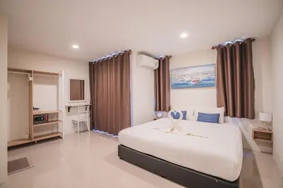 a bedroom with a large white bed in a room at 24sqm room close to beach and Muay Thai gym in Ao Nang Beach