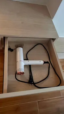 a hairdryer in a box with a cord at Fantasea Condo Kamala beach 1BR apart B1 in Kamala Beach