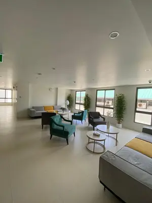 a large living room with couches and chairs and tables at Fantasea Condo Kamala beach 1BR apart B1 in Kamala Beach