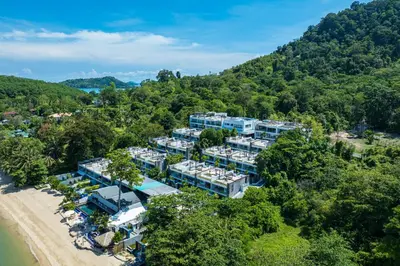 an aerial view of a resort in the trees at Phuket Moonlit Bay Seaview Resort & Spa in Phuket Town