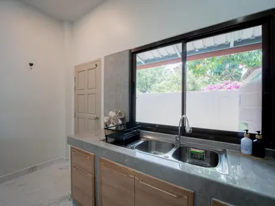 a kitchen with a sink and a window at Leivi Villa 3 bedrooms in Rawai Beach