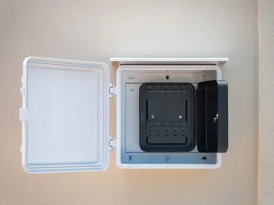a cell phone in a box on a wall at Leivi Villa 3 bedrooms in Rawai Beach