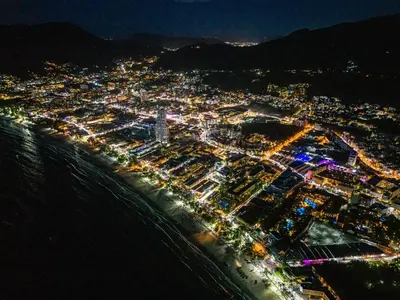 an aerial view of a city at night at PatongTower\u6b65\u884c\u76f4\u8fbe\u6d77\u6ee9\u9ad8\u901fwifi605S in Patong Beach