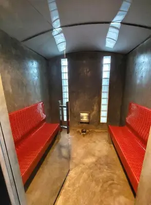 a empty room with red seats and windows at 11 - Peaceful Escape on Naiyang Beach in Nai Yang Beach
