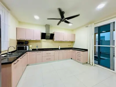 a kitchen with pink cabinets and a ceiling fan at Villa 3bd & pool - Rawai - Nai Harn in Rawai Beach