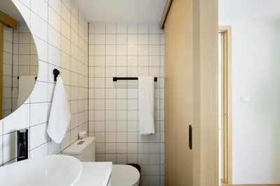 a bathroom with a sink and a toilet at Fantasea Condo Kamala B204 2BDRM by Phuket Sabay Rent in Kamala Beach