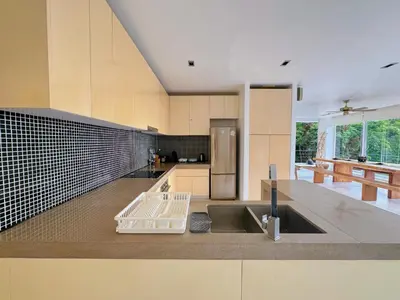 a kitchen with a sink and a counter top at Peaceful The Trees Kamala Hillside in Kamala Beach