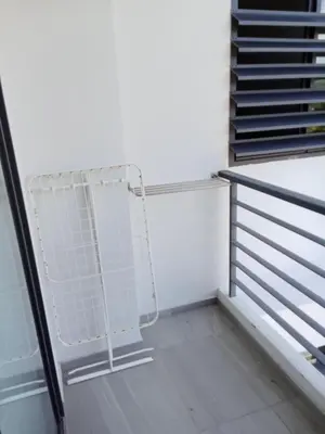 a staircase with a white railing next to a stair case at Ocean View Apt - 1BR T2-613 in Chalong