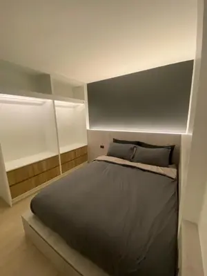 a bedroom with a large bed in a room at Apartment in Rawai in Ban Saiyuan (1)
